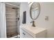 Bathroom with modern vanity and tiled shower at 7070 W 39Th Ave, Wheat Ridge, CO 80033