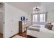 Comfortable bedroom with plenty of natural light and ample storage at 7070 W 39Th Ave, Wheat Ridge, CO 80033