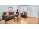 Bright living room featuring modern decor, stylish furnishings, and hardwood floors at 7070 W 39Th Ave, Wheat Ridge, CO 80033