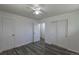 Bright bedroom features stylish floors and ample closet space at 8800 W Kentucky Ave, Lakewood, CO 80226