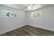 Bedroom with hardwood-style floors and bright natural light at 8800 W Kentucky Ave, Lakewood, CO 80226