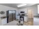 Modern kitchen featuring stainless steel appliances, sleek countertops, and ample cabinet space for storage and meal preparation at 8800 W Kentucky Ave, Lakewood, CO 80226