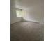 A comfortable bedroom with large windows at 14598 E Evans Ave, Aurora, CO 80014