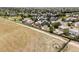 Aerial shot displaying a home's backyard, neighborhood, and proximity to open spaces at 3972 S Shawnee Way, Aurora, CO 80018
