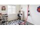 Playful bedroom featuring toys and a custom track design on the wall at 3972 S Shawnee Way, Aurora, CO 80018