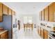 Bright, airy kitchen with lots of natural light, complete with modern appliances and a dining nook for Gathering meals at 3972 S Shawnee Way, Aurora, CO 80018