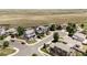 A charming neighborhood street view showcases well-manicured lawns and inviting homes at 3972 S Shawnee Way, Aurora, CO 80018