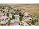 Aerial neighborhood view of modern homes with solar panels and landscaped yards at 3972 S Shawnee Way, Aurora, CO 80018