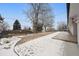 Large backyard with a gentle slope and a view of the neighborhood at 1045 W 101St Ave, Northglenn, CO 80260