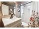 Stylish bathroom features a shower, modern vanity, and elegant fixtures at 1045 W 101St Ave, Northglenn, CO 80260