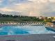 Beautiful community swimming pool with a rainbow in the background at 1828 Aquamarine Ct, Castle Rock, CO 80108