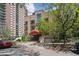 Brick building exterior with landscaped entrance and visible address at 1130 N Pennsylvania St # 208, Denver, CO 80203