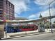 Bus station that provides access to different parts of the city, with the capitol building in the background at 1130 N Pennsylvania St # 208, Denver, CO 80203
