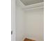 Small closet with white walls, wooden floor, top shelf and light at 1130 N Pennsylvania St # 208, Denver, CO 80203