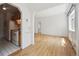 Hardwood floors flow through the living area adjacent to the cozy kitchen at 1130 N Pennsylvania St # 208, Denver, CO 80203
