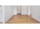 Bright living room featuring beautiful hardwood floors and neutral wall paint at 1130 N Pennsylvania St # 208, Denver, CO 80203