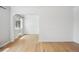 Open-concept living room featuring hardwood floors, with a window view at 1130 N Pennsylvania St # 208, Denver, CO 80203