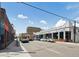 Buildings on a street with shops and restaurants, including a coffee shop at 1130 N Pennsylvania St # 208, Denver, CO 80203