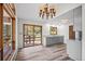 Bright dining room with scenic views, wet bar and sliding glass door to deck at 542 Harris Dr, Idaho Springs, CO 80452