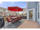 Inviting back deck with outdoor furniture, dining set and hot tub with lots of space to entertain Gathering and friends at 907 Eldorado Dr, Superior, CO 80027