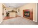 Finished basement features a stylish bar area and cozy fireplace with tile surround at 907 Eldorado Dr, Superior, CO 80027
