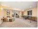 Spacious basement with seating area, game tables, and neutral carpeting at 907 Eldorado Dr, Superior, CO 80027