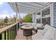 Enjoy the outdoors on this deck with comfortable seating around a fire pit at 907 Eldorado Dr, Superior, CO 80027