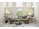 Cozy living room with high ceilings and large windows, providing natural light and a relaxing atmosphere at 907 Eldorado Dr, Superior, CO 80027