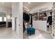 Spacious walk-in closet with custom shelves, drawers and plenty of room for storage at 8033 Galileo Way, Littleton, CO 80125