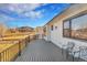 Wide angle shot of a modern deck with dark deck boards and black metal railings at 804 Spyglass Cir, Louisville, CO 80027