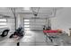 Spacious three car garage with bright lighting and doors and room for storage at 804 Spyglass Cir, Louisville, CO 80027