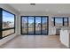 Living area featuring a breakfast bar and large sliding glass doors to backyard deck at 804 Spyglass Cir, Louisville, CO 80027