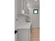 Bright pantry featuring white cabinetry, quartz countertops, and a stainless steel faucet at 804 Spyglass Cir, Louisville, CO 80027