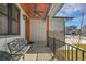 Inviting covered porch area with ceiling fan, seating and views of the neighborhood at 804 Spyglass Cir, Louisville, CO 80027