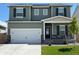 Charming two-story home with a two-car garage and well-maintained lawn at 2244 Alyssa St, Fort Lupton, CO 80621