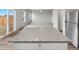 Kitchen island with granite countertops in an open floor plan at 2244 Alyssa St, Fort Lupton, CO 80621