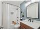 Updated bathroom features modern vanity, subway tile shower with dark bronze fixtures at 2287 Pinto Trl, Elizabeth, CO 80107