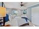 Relaxing bedroom with blue accents, soft carpet, and ample natural light at 2287 Pinto Trl, Elizabeth, CO 80107