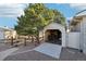 This outbuilding features a convenient drive-in ramp, providing easy access for storage or workshop activities at 2287 Pinto Trl, Elizabeth, CO 80107