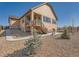 Exterior home shot of the outdoor patio and backyard landscaping at 23709 E Caleb Pl, Aurora, CO 80016