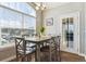 Bright dining area with large window views and a stylish light fixture at 18669 Stroh Rd # 10208, Parker, CO 80134