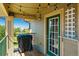 Cozy patio with a grill, string lights, and scenic views of the surrounding neighborhood at 18669 Stroh Rd # 10208, Parker, CO 80134