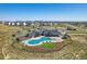 Community pool and surrounding landscape at 1161 E Witherspoon Dr, Elizabeth, CO 80107