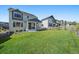 View of house and community from backyard at 1161 E Witherspoon Dr, Elizabeth, CO 80107