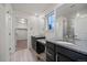 Elegant bathroom with granite countertop and walk-in shower at 1161 E Witherspoon Dr, Elizabeth, CO 80107