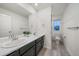 Double vanity bathroom with marble countertop at 1161 E Witherspoon Dr, Elizabeth, CO 80107