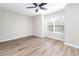 Bright bedroom with modern ceiling fan and a large window at 2716 E Otero Pl # 6, Centennial, CO 80122