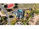 Aerial view of estate including a pool, a tennis court, gardens, and circular driveway at 49 Charlou Cir, Cherry Hills Village, CO 80111