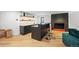 Stylish bar area with modern lighting, counter seating, and a dark accent wall at 49 Charlou Cir, Cherry Hills Village, CO 80111