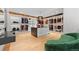Expansive walk-in closet with custom shelving, island, and ample storage at 49 Charlou Cir, Cherry Hills Village, CO 80111